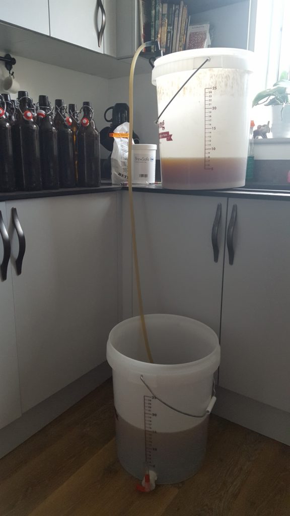 Siphon into bottler bucket before beer bottling